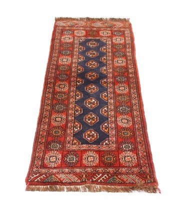 فرش دستباف قدیمی کناره طول یک متر ترکمن کد 709038